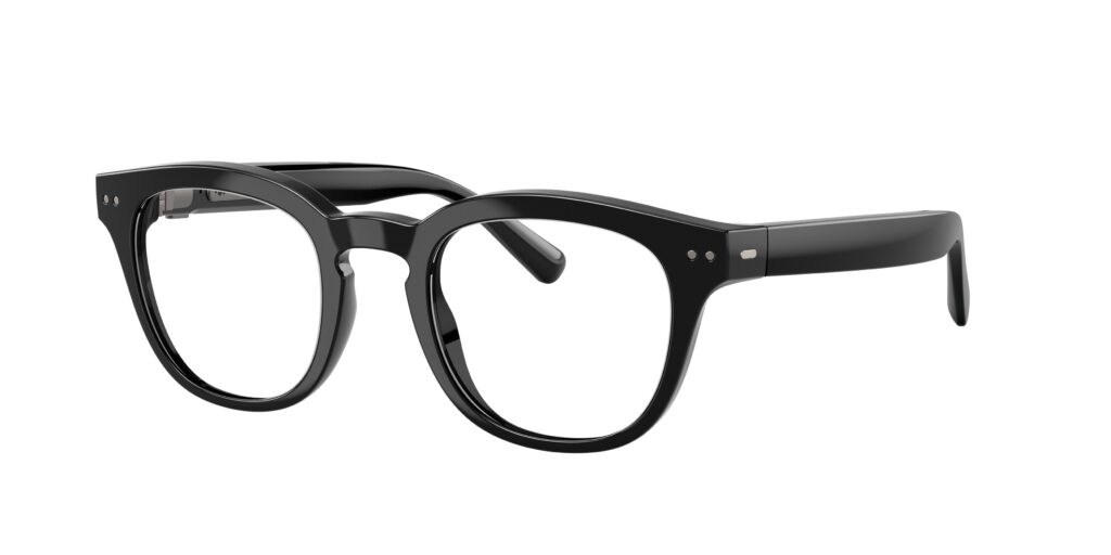 Thick black plastic eyeglasses with rounded rectangular lenses, close-up view