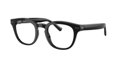 Thick black plastic eyeglasses with rounded rectangular lenses, close-up view