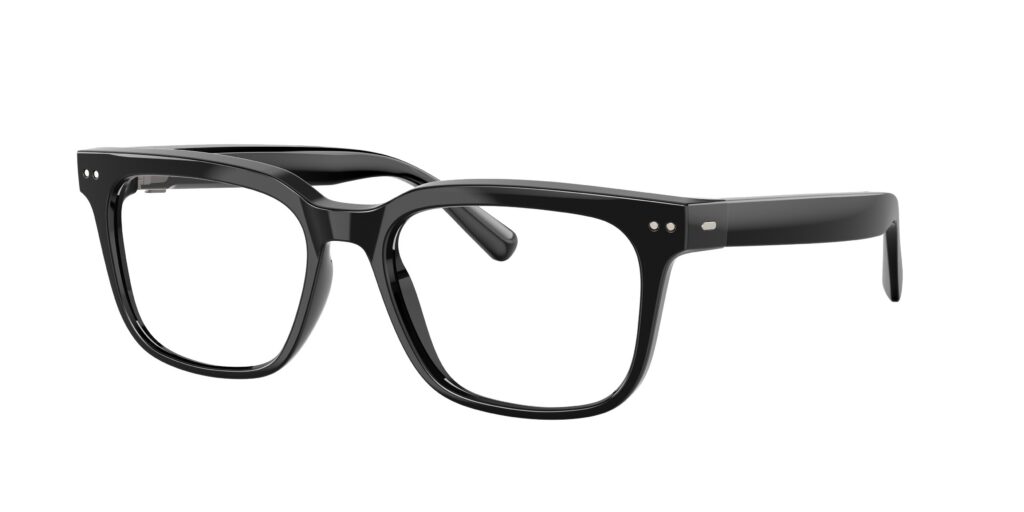 Close-up of glossy black square-frame eyeglasses with silver rivets on the temples on a white background.
