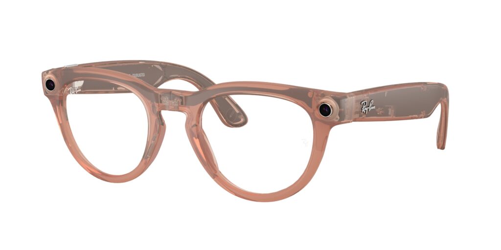 Pink transparent Ray-Ban eyeglasses with visible logo on the temple (close-up).